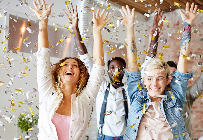 Group celebration with confetti