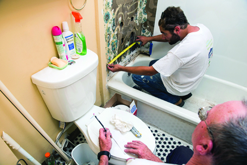 Rebuilding Together volunteers enhance bathroom function and safety.