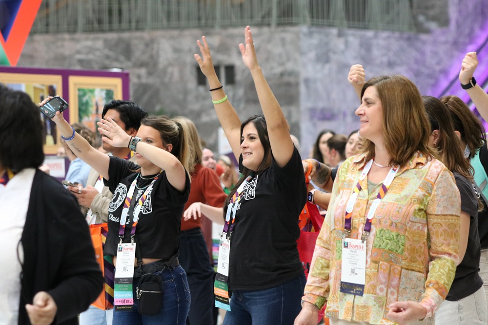 Group of attendees celebrating at AOTA INSPIRE