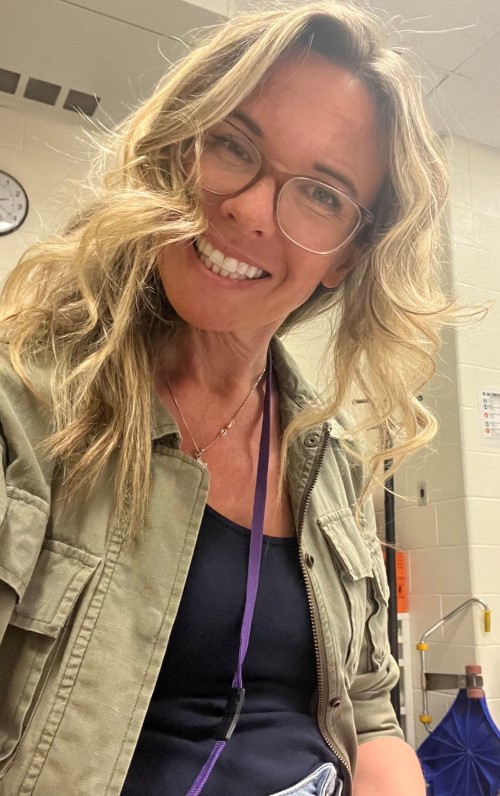 K.R OTR/L, smiling in close up shot