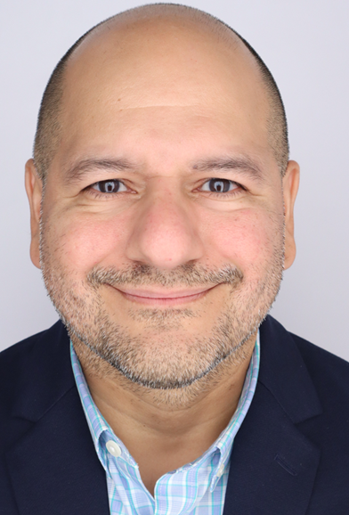 person-smiling-blue-shirt-jacket