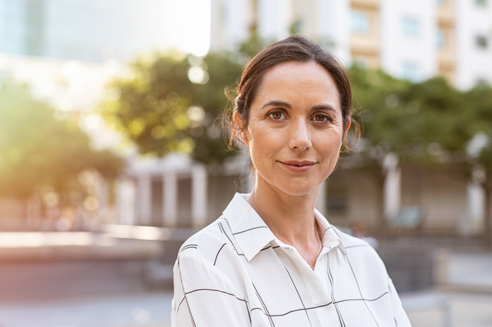 Outdoor headshot of professional woman