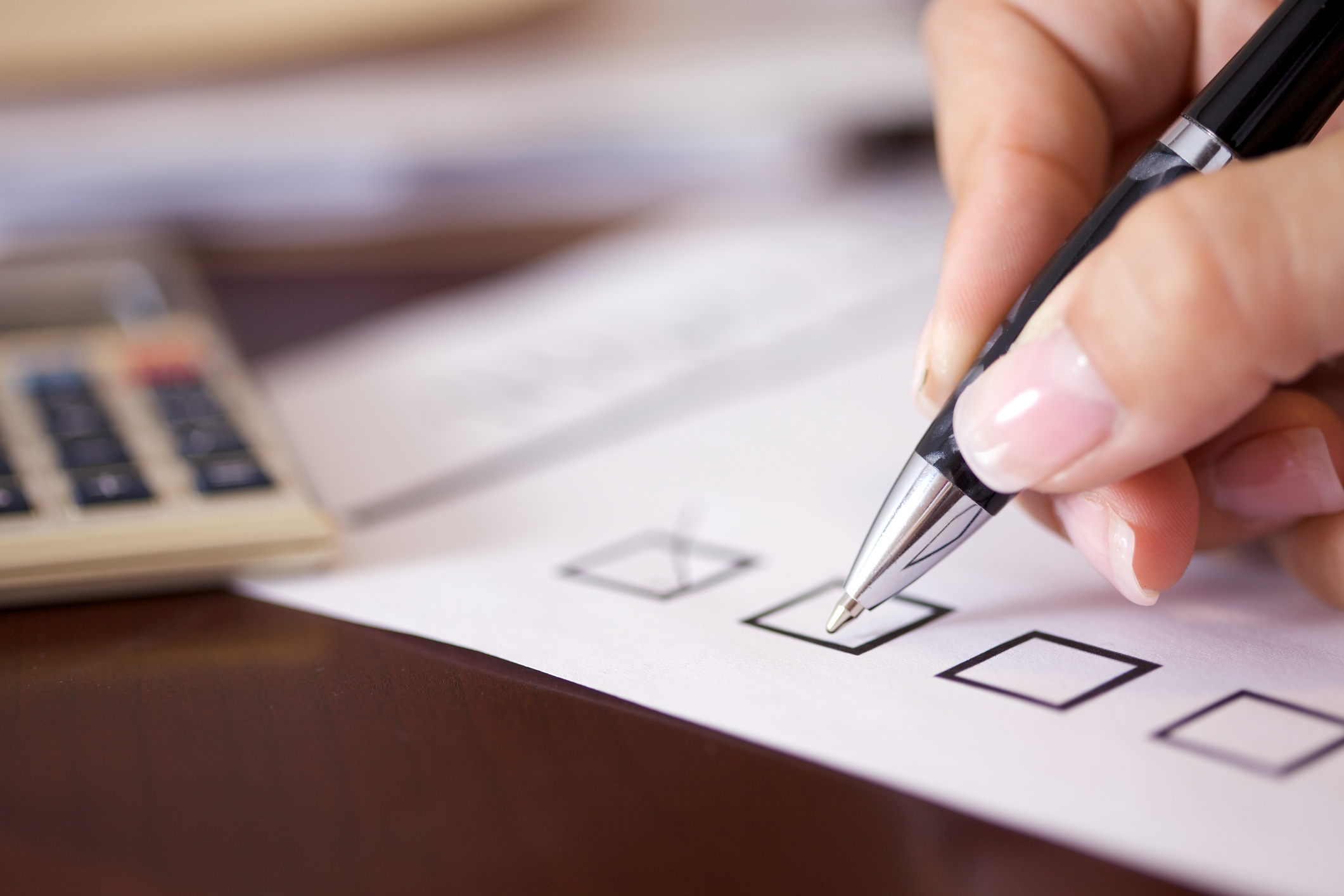 Hand checking off checklist