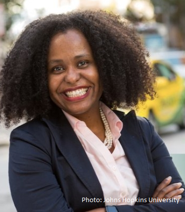 smiling-woman-crossing-arms-over-chest
