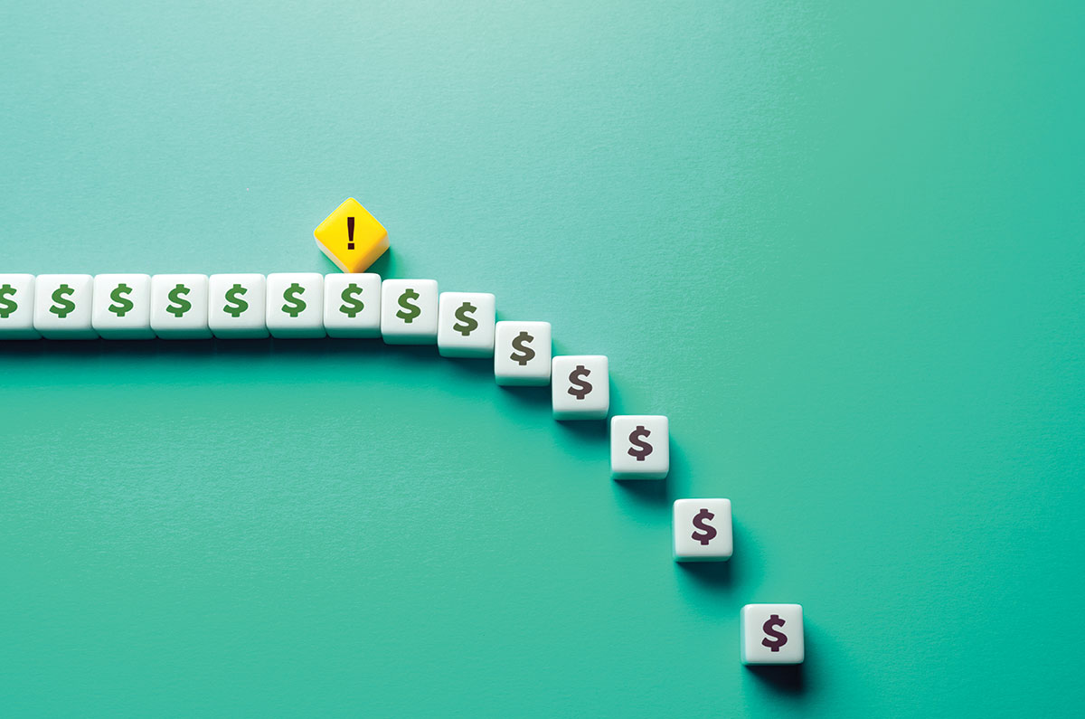 Dollar sign tiles going downward, moving from green to black, and there is a yellow exclamation tile at the top