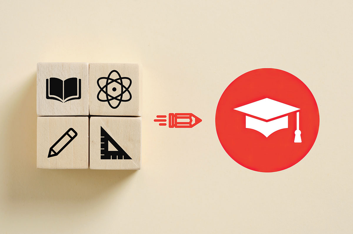 An illustration of a block with a book, pencil, protractor, and atom and there is a small pencil moving from the block toward a white mortar board in a red circle