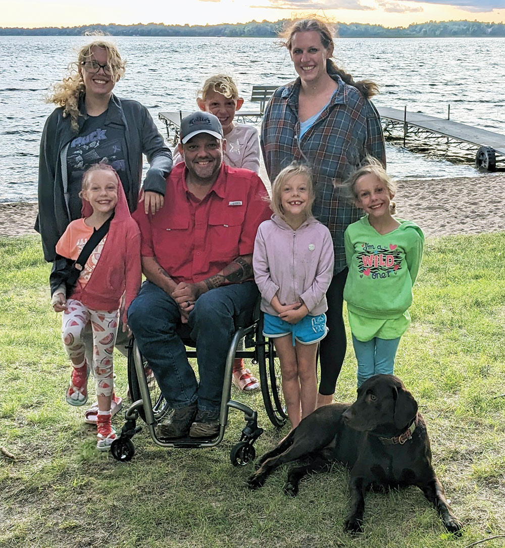 Bill and his family spending time at the lake