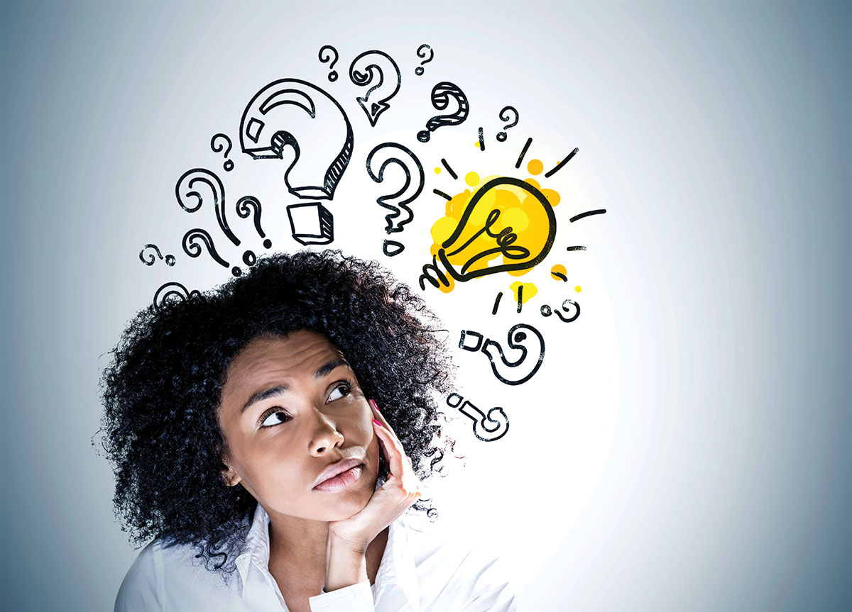 Woman sitting with her head resting in her hand with a yellow light bulb and questions marks above her head