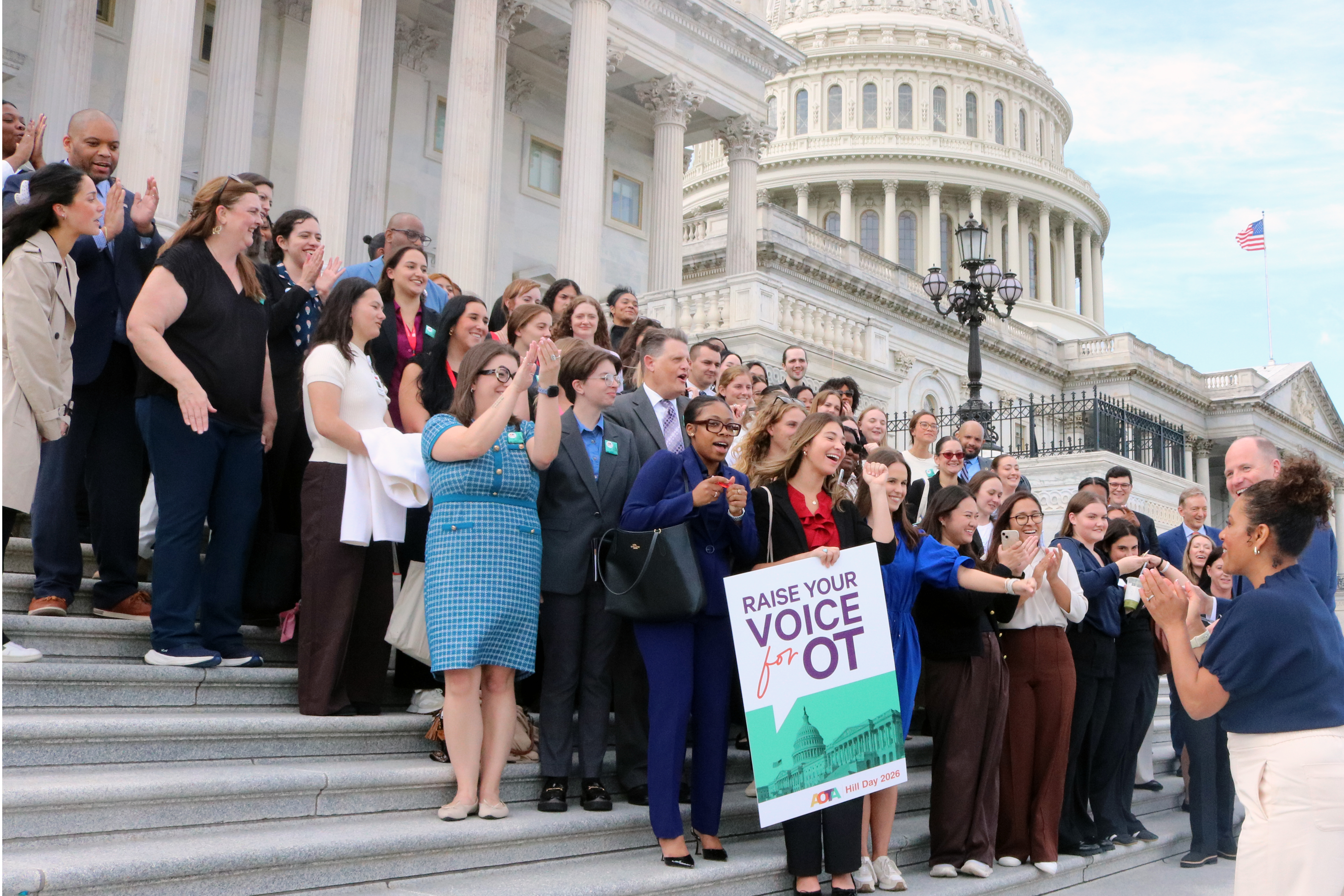 Rep. Tim Kennedy (NY), an occupational therapist, and AOTA President Arameh Anvarizadeh speak to OT advocates on the steps of the U.S. Capitol