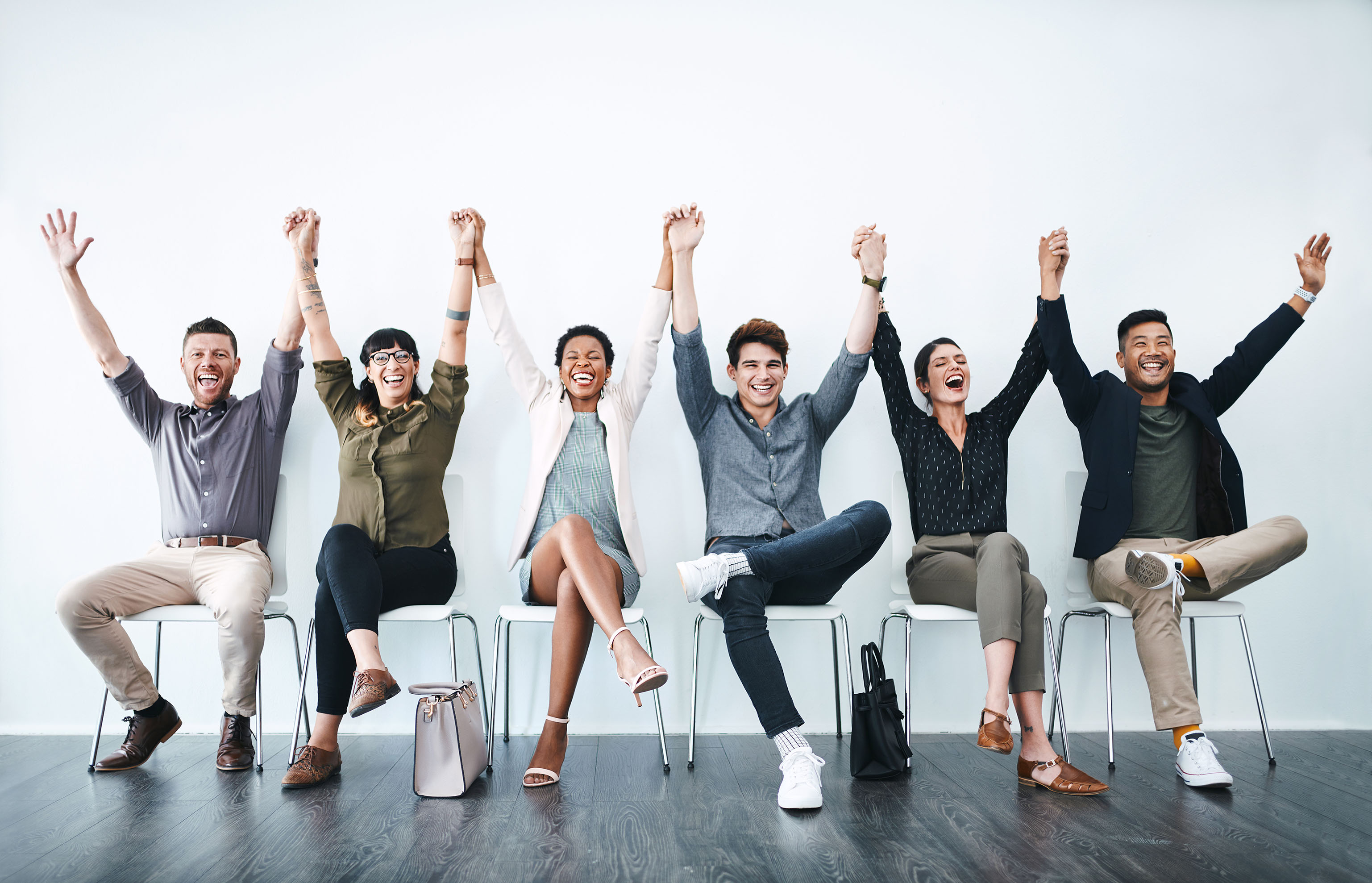 People with hands up