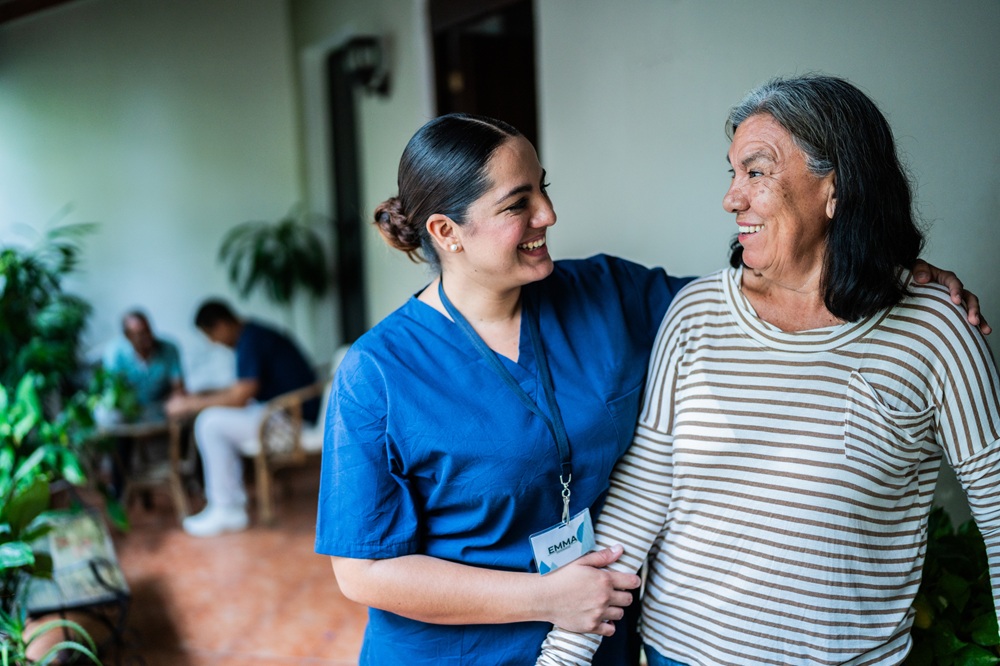 Occupational therapy practitioner assisting patient